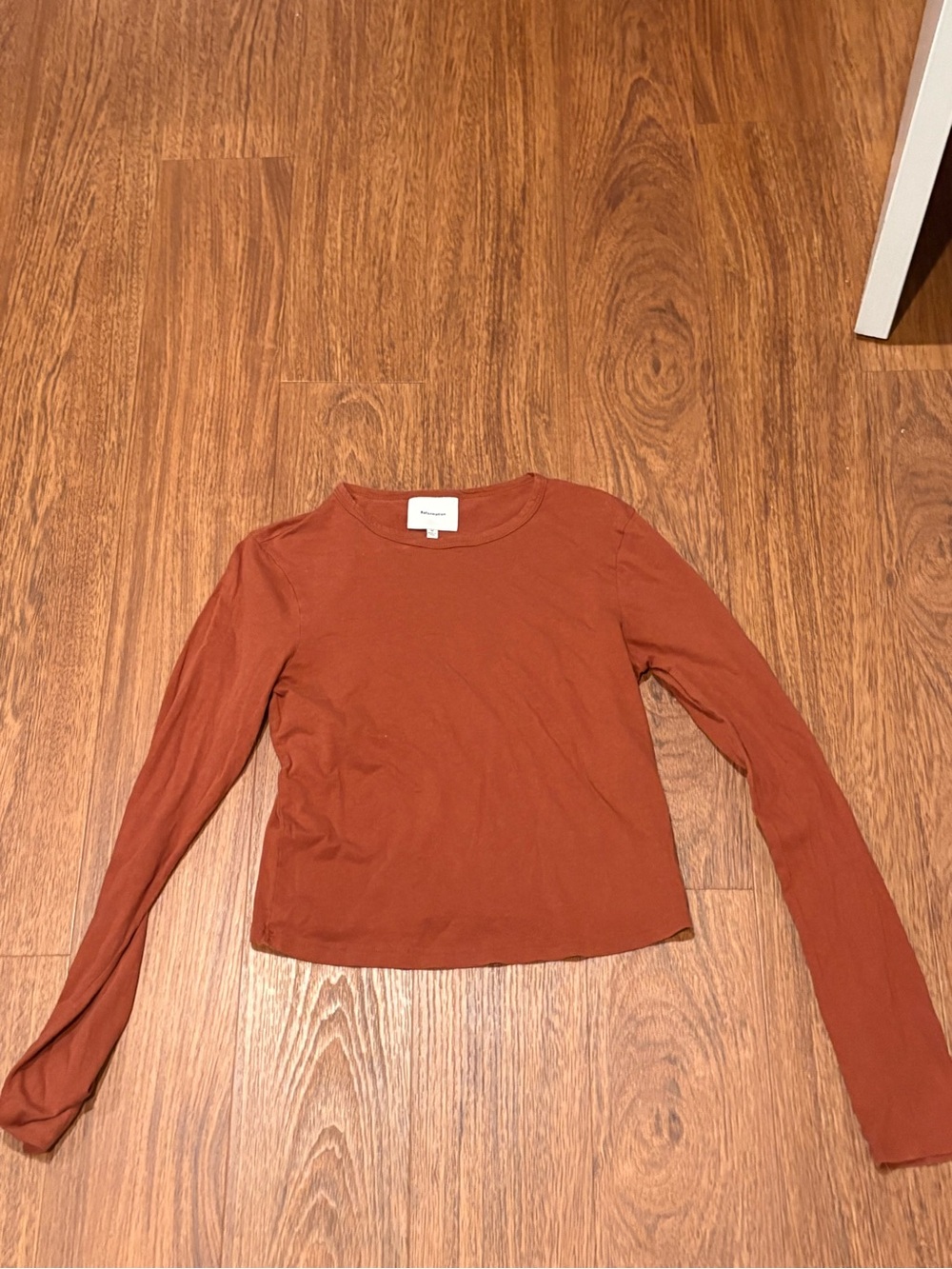 Reformation Long Sleeve Crewneck Top in Rust Orange